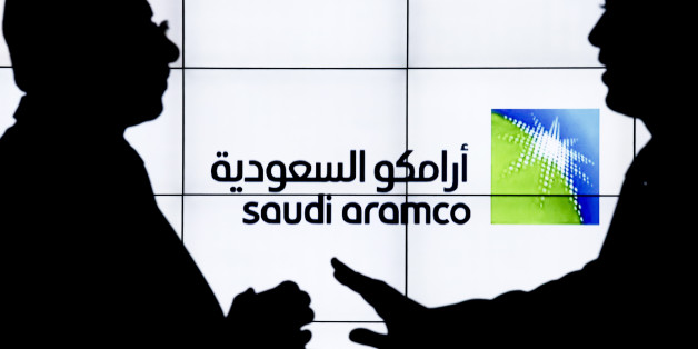A Saudi Arabian Oil Co. (Aramco) logo sits on an electronic display at the company's corporate pavilion during the 22nd World Petroleum Congress in Istanbul, Turkey, on Wednesday, July 12, 2017. Oil fell from the lowest closing price in two weeks as talk of Libya and Nigeria being requested to cap their production failed to dispel doubts about the effectiveness of OPECs cut. Photographer: Kostas Tsironis/Bloomberg via Getty Images