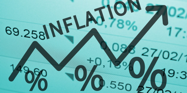 Word Inflation on up trend arrow, with financial data visible on the background.