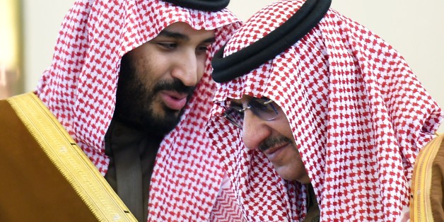 Saudi Defence Minister Mohamed bin Salman (L) talks with Crown Prince and Interior Minister Mohammed bin Nayef during the 136th Gulf Cooperation Council (GCC) summit, in the Saudi capital Riyadh, on December 9, 2015. Gulf monarchs began arriving in Saudi Arabia for an annual summit, facing challenges including plunging oil revenues, the war in Yemen, pressure for peace in Syria and signs of regional divisions. / AFP / FAYEZ NURELDINE (Photo credit should read FAYEZ NURELDINE/AFP/Getty Im