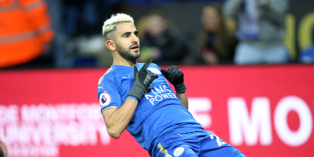 LEICESTER, ENGLAND - JANUARY 01: Riyad Mahrez of Leicester City celebrates after scoring to make it 1-0 during the Premier League match between Leicester City and Huddersfield at King Power Stadium on January 1st , 2018 in Leicester, United Kingdom. (Photo by Plumb Images/Leicester City FC via Getty Images)