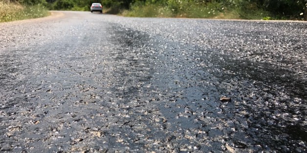 MERSIN, TURKEY - JULY 4: A road melts as the temperature rises in Mersin, Turkey on July 4, 2017. Heat wave conditions make life tough in Turkey's Mediterranean Region as temperature reached to near 43 degrees centigrade in Adana and 45 degrees in Hatay and Mersin. (Photo by Mustafa Gungor/Anadolu Agency/Getty Images)