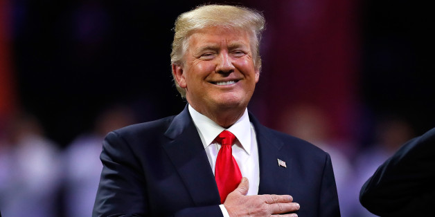 ATLANTA, GA - JANUARY 08: U.S. President Donald Trump on field during the national anthem prior to the CFP National Championship presented by AT&T between the Georgia Bulldogs and the Alabama Crimson Tide at Mercedes-Benz Stadium on January 8, 2018 in Atlanta, Georgia. (Photo by Kevin C. Cox/Getty Images)
