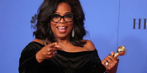 75th Golden Globe Awards â Photo Room â Beverly Hills, California, U.S., 07/01/2018 â Oprah Winfrey poses backstage with her Cecil B. DeMille Award. REUTERS/Lucy Nicholson