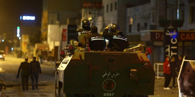 TUNIS, TUNISIA - JANUARY 09: Security forces take security measures after demonstrators burn tyres and garbage containers during a protest against price hikes, at al-Tadamun neighborhood in Tunis, Tunisia on January 09, 2018. (Photo by Yassine Gaidi/Anadolu Agency/Getty Images)