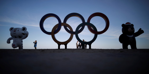 The 2018 PyeongChang Winter Olympics mascot Soohorang, Paralympics mascot Bandabi and the Olympic Rings are displayed at the Gyeongpodae beach in Gangneung, South Korea, October 31, 2017. REUTERS/Kim Hong-Ji