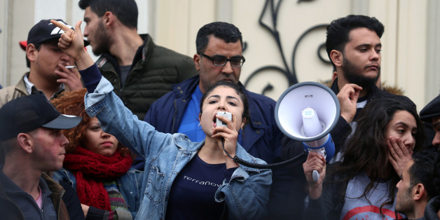 A demonstrating graduate shouts slogans during protests against rising prices and tax increases, in Tunis, Tunisia January 9, 2018. REUTERS/Zoubeir Souissi