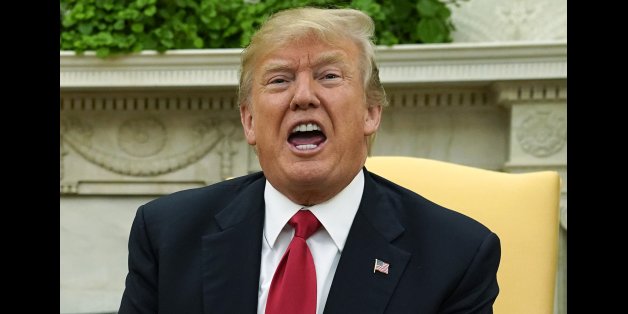 U.S. President Donald Trump speaks to the media as he meets with Norwegian Prime Minister Erna Solberg in the Oval Office at the White House in Washington, U.S., January 10, 2018. REUTERS/Jonathan Ernst