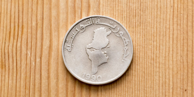 Tunisian currency, Tunisian dinars on wooden table background