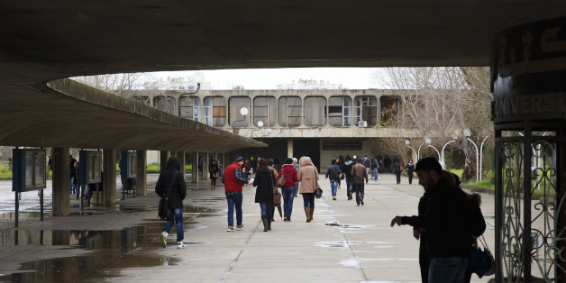 ALGIERS, ALGERIA - JANUARY 25: Students walk across campus of University of Sciences and Technology Houari Boumediene in January 25, 2015 in Algiers, Algeria. (Photo by Thomas Trutschel/Photothek via Getty Images)