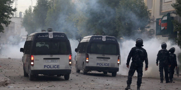 Tear gas is seen as protesters clash with riot police attempting to disperse the crowd during demonstrations against rising prices and tax increases, in Tebourba, Tunisia, January 9, 2018. REUTERS/Zoubeir Souissi