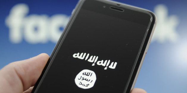 The sumbol for the terrorist ISIS or Daesh organisation is seen on a smartphon in this photo illustration on December 4, 2017. (Photo by Jaap Arriens/NurPhoto via Getty Images)