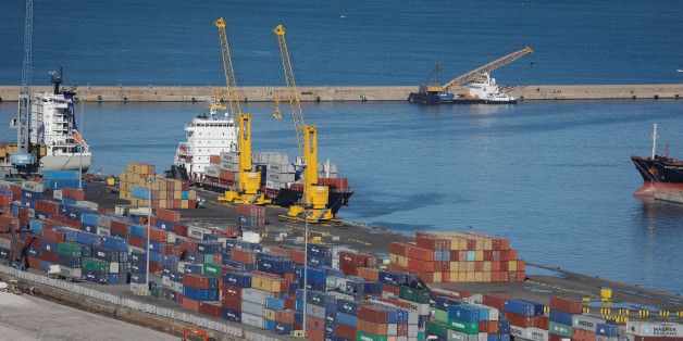 Containers sit stacked at a port terminal in Algiers, Algeria November 12, 2017. Picture taken November 12,2017. REUTERS/ Zohra Bensemra