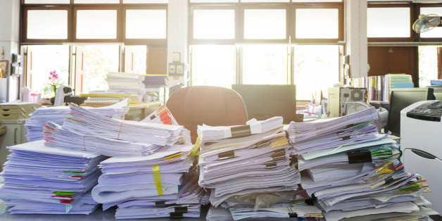 Business Concept, Pile of unfinished documents on office desk, Stack of business paper