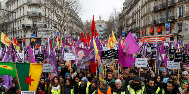 Pro-Kurdish protesters attend a demonstration against the Turkish president's visit to Paris and to urge French authorities to find those responsible for the killing of three Kurdish activists in Paris, France, January 6, 2018. REUTERS/Gonzalo Fuentes