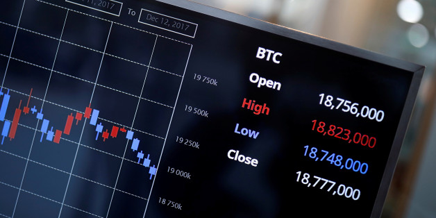 An electric board showing exchange rate between South Korean Won and Bitcoin at a cryptocurrencies exchange in Seoul, South Korea December 13, 2017. REUTERS/Kim Hong-Ji