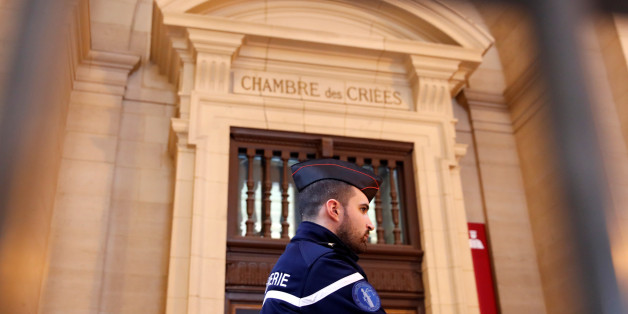 A French gendarme waits for the start of the trial of Jawad Bendaoud, the man accused of housing the suspected planner of the November 2015 attacks, at the courts in Paris, France, January 24, 2018. REUTERS/Christian Hartmann