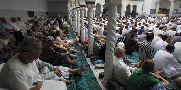 Worshippers attend morning prayers of Eid al-Fitr holiday, marking the end of the holy month of Ramadan, at al Biar mosque in Algiers, Algeria, July 17, 2015.REUTERS/Ramzi Boudina