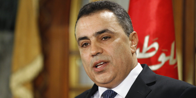 Tunisia's Prime Minister Mehdi Jomaa speaks during a news conference in Tunis January 26, 2014. Jomaa on Sunday named a new caretaker cabinet to govern until elections in one of the last steps to democracy three years after the uprising against autocrat Zine el-Abidine Ben Ali. REUTERS/Anis Mili (TUNISIA - Tags: POLITICS HEADSHOT)