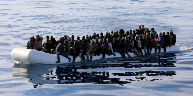 Migrants are seen in a rubber dinghy as they are rescued by Libyan coast guards in the Mediterranean Sea off the coast of Libya, January 15, 2018. Picture taken January 15, 2018. REUTERS/Hani Amara