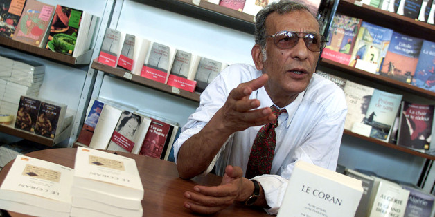 Youssef Seddik the anthropologist author of the Coran translated into French with commentary, attends the International Book Fair in Algiers, September 20, 2002.