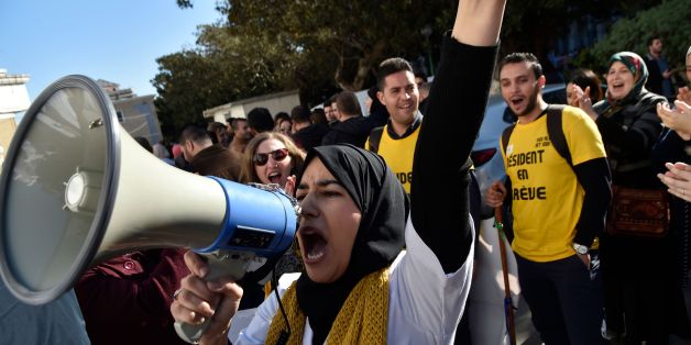 Algerian doctors and dentists who are completing their residency stage of their studies stage a sit-in outside the Mustapha Bacha hospital in Algiers, on January 30, 2018, as part of a two-month-long strike protesting against compulsory civil service. / AFP PHOTO / RYAD KRAMDI (Photo credit should read RYAD KRAMDI/AFP/Getty Images)
