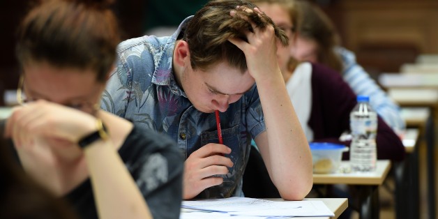 High school students take the philosophy exam, the first test session of the 2017 baccalaureate (high school graduation exam) on June 15, 2017 at the Fustel de Coulanges high school in Strasbourg, eastern France. A total of 520.000 Students of general and technological graduating classes are registered to take their written baccalaureat exams at over 4 400 examination centres across France between June 15-June 22, 2017. / AFP PHOTO / FREDERICK FLORIN (Photo credit should read FREDERICK F