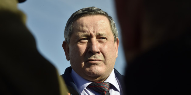 A picture taken on January 16, 2018 at In Amenas gas plant, 1,300 kilometres (800 miles) southeast of Algiers, shows Abdelmoumen Ould Kaddour, CEO of Sonatrach during a ceremony to mark five years since a deadly raid by Al-Qaeda-linked jihadists which left 40 hostages dead.The assault -- which left 29 attackers dead -- was claimed by one-eyed Algerian jihadist Mokhtar Belmokhtar, a former head of Al-Qaeda in the Islamic Maghreb. / AFP PHOTO / RYAD KRAMDI (Photo credit should read RYAD KRA
