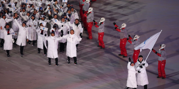 PYEONGCHANG-GUN, SOUTH KOREA - FEBRUARY 09: The North Korea and South Korea Olympic teams enter together under the Korean Unification Flag during the Parade of Athletes during the Opening Ceremony of the PyeongChang 2018 Winter Olympic Games at PyeongChang Olympic Stadium on February 9, 2018 in Pyeongchang-gun, South Korea. (Photo by Dan Istitene/Getty Images)