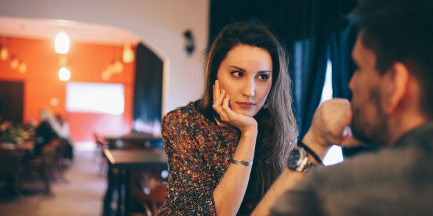 Friends or a couple hanging out in a cafe in Belgrade, Serbia, Eastern Europe. They're having a serious discussion or flirting a bit?