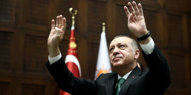ANKARA, TURKEY - FEBRUARY 13: President of Turkey and Leader of the Justice and Development Party (AK Party) Recep Tayyip Erdogan greets members of AK Party during AK Party's parliamentary group meeting at the Grand National Assembly of Turkey (TBMM) in Ankara, Turkey on February 13, 2018. (Photo by Rasit Aydogan/Anadolu Agency/Getty Images)