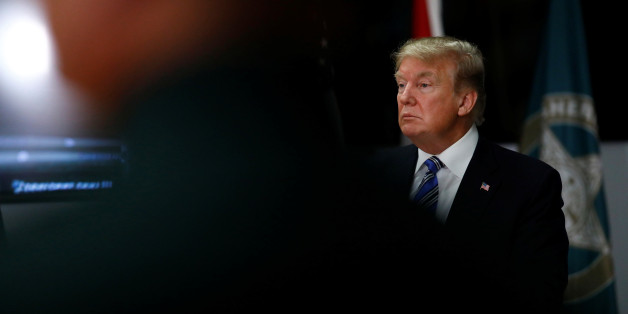 U.S. President Donald Trump meets with law enforcement at the Broward County Sheriff's Office in the wake of the shooting at Marjory Stoneman Douglas High School in Fort Lauderdale, Florida, U.S., February 16, 2018. REUTERS/Eric Thayer