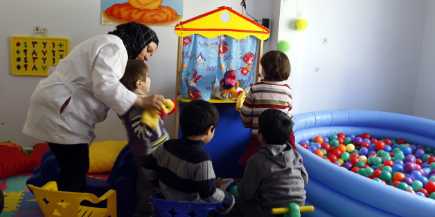 Autistic children play at the Consulting Centre for Autism in Amman, March 30, 2010, one of the few places in the country that helps children with the condition. The world will mark World Autism Awareness Day on April 2. REUTERS/Ali Jarekji (JORDAN - Tags: HEALTH EDUCATION)