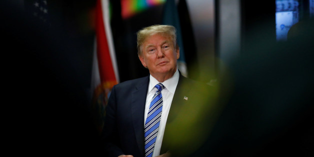 U.S. President Donald Trump meets with law enforcement at the Broward County Sheriff's Office in the wake of the shooting at Marjory Stoneman Douglas High School in Fort Lauderdale, Florida, U.S., February 16, 2018. REUTERS/Eric Thayer