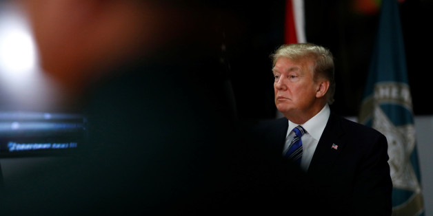 U.S. President Donald Trump meets with law enforcement at the Broward County Sheriff's Office in the wake of the shooting at Marjory Stoneman Douglas High School in Fort Lauderdale, Florida, U.S., February 16, 2018. REUTERS/Eric Thayer
