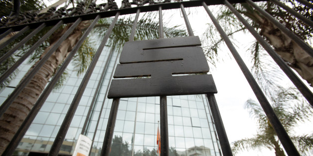 the logo of The state energy company Sonatrach is pictured on a gate outside of the the headquarters in Algiers, Algeria june 26, 2016.Reuters/Ramzi Boudia
