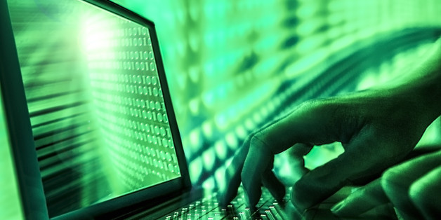 closeup laptop hacker hands