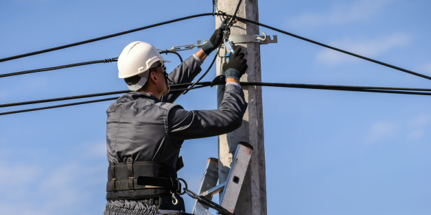 Telephone Engineer At Work