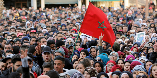 People attend a protest after two miners died while working in a clandestine coal mine, in Jerada, Morocco December 26, 2017. REUTERS/Youssef Boudlal