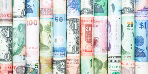 A backgrounds with colorful of many roll curreny from many country