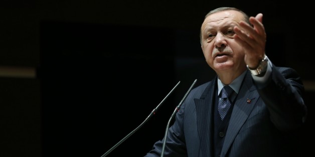 ANKARA, TURKEY - FEBRUARY 23: (----EDITORIAL USE ONLY MANDATORY CREDIT - 'TURKISH PRESIDENCY / MURAT CETINMUHURDAR / HANDOUT' - NO MARKETING NO ADVERTISING CAMPAIGNS - DISTRIBUTED AS A SERVICE TO CLIENTS----) President of Turkey and Leader of the Justice and Development Party (AK Party) Recep Tayyip Erdogan delivers a speech during the Turkey's ruling Justice and Development (AK) Partys extended meeting of provincial heads at the AK Party's headquarters in Ankara, Turkey on February 23, 2018. (