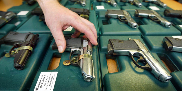 A selection of blank-firing weapons seized by Greater Manchester Police is displayed January 10, 2003. The British government cast around on Friday for measures to curb the country's growing gun culture after figures showed a leap in illegal arms use. The government plans to ban airguns and replica firearms, often illegally converted to fire live ammunition.