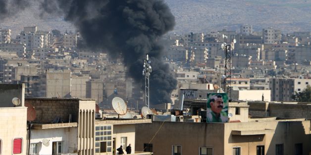 Smoke is seen billowing from the northern Syrian Kurdish town of Afrin on January 31, 2018. Turkey and allied Syrian rebel groups launched operation Olive Branch on January 20 against the Kurdish People's Protection Units (YPG), which controls the Afrin region. / AFP PHOTO / Ahmad Shafie BILAL (Photo credit should read AHMAD SHAFIE BILAL/AFP/Getty Images)
