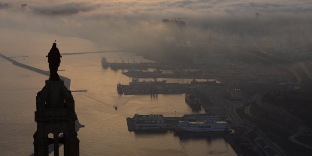 ORAN, ALGERIA - APRIL 9: Foggy view on April 9, 2011, in Oran, Algeria, of the port of Mers El Kebir at sunrise. In the foreground is the statue of the Virgin Mary on the Santa Cruz chapel. (Photo by Reza/Getty Images)