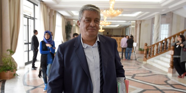 Member of Tunisia's secular Nidaa Tounes party, Mondher Belhaj Ali, arrives at a press conference to announce its withdrawal from the party, on November 4, 2015 at the National Assembly in Tunis. Rival ambitions, insults and accusations of violence have brought Tunisia's ruling party to the brink of collapse as the country struggles to lead the way towards a post-Arab Spring democracy. AFP PHOTO / FETHI BELAID (Photo credit should read FETHI BELAID/AFP/Getty Images)