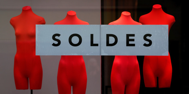 A banner reading "Sales" is seen on a clothing store's front window during the start of winter sales in Strasbourg, France January 10, 2018. REUTERS/Vincent Kessler