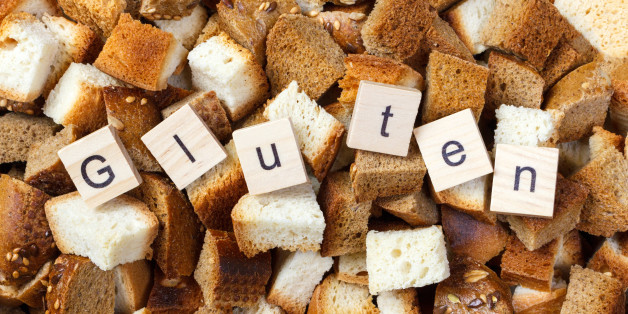 Slice of rusk bread with Gluten text concept.