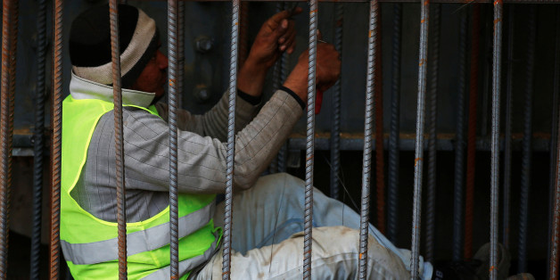 A construction worker checks rebars on site at the Grand Egyptian Museum on the outskirts of Cairo, Egypt January 30, 2018. Picture taken January 30, 2018. REUTERS/Amr Abdallah Dalsh