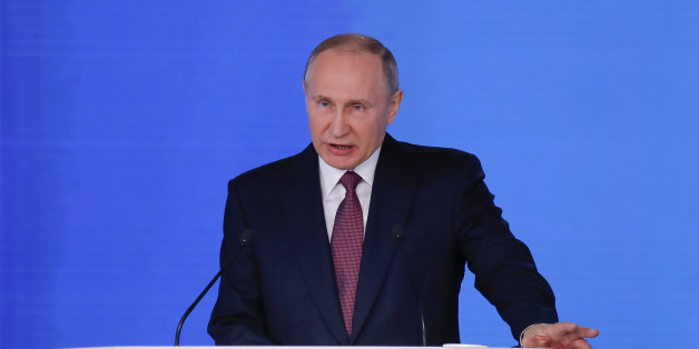 Russian President Vladimir Putin addresses the Federal Assembly, including the State Duma parliamentarians, members of the Federation Council, regional governors and other high-ranking officials, in Moscow, Russia March 1, 2018. REUTERS/Maxim Shemetov