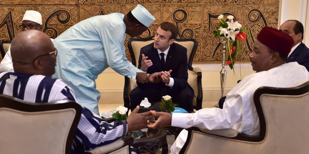 Chad's president Idriss Deby Itno speaks with French President Emmanuel Macron as they gather with Mali's President Ibrahim Boubacar Keita, President of Burkina Faso Roch Marc Christian Kabore, Niger's President Mahamadou Issoufou and Mauritanian President Mohamed Ould Abdel Aziz for a meeting during a G5 Sahel summit, in Bamako, Mali July 2, 2017. REUTERS/Christophe Archambault/Pool