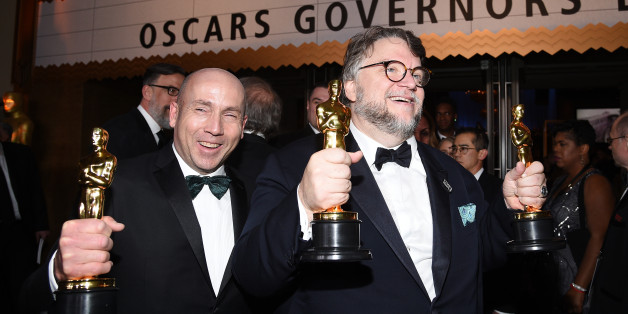 HOLLYWOOD, CA - MARCH 04: Filmmaker Guillermo del Toro (R), winner of the Best Director and Best Picture awards for 'The Shape of Water,' and producer J. Miles Dale, winner of the Best Picture award for 'The Shape of Water' attend the 90th Annual Academy Awards Governors Ball at Hollywood & Highland Center on March 4, 2018 in Hol ywood, California. (Photo by Kevork Djansezian/Getty Images)